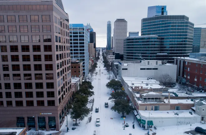 Downtown Austin glowed bright while thousands went without power. It’s ‘complicated,’ Austin Energy says.